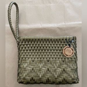 Maria Victoria Women’s wristlet with top zipper closure.